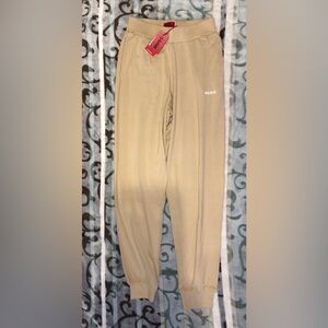 HUGO BOSS beige JOGGERS with white HUGO Logo size SMALL